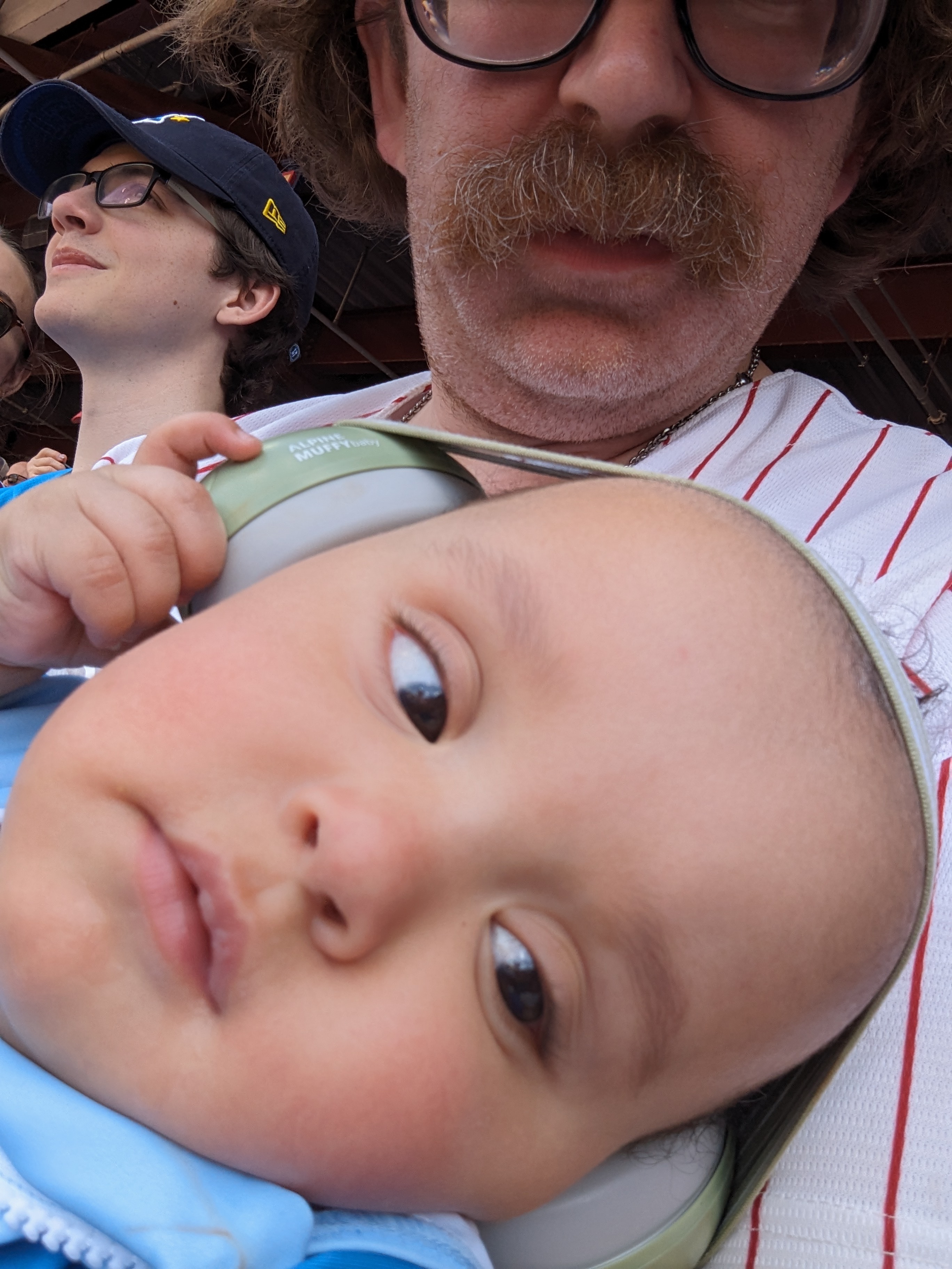 Hosea rocking his baby ear muffs