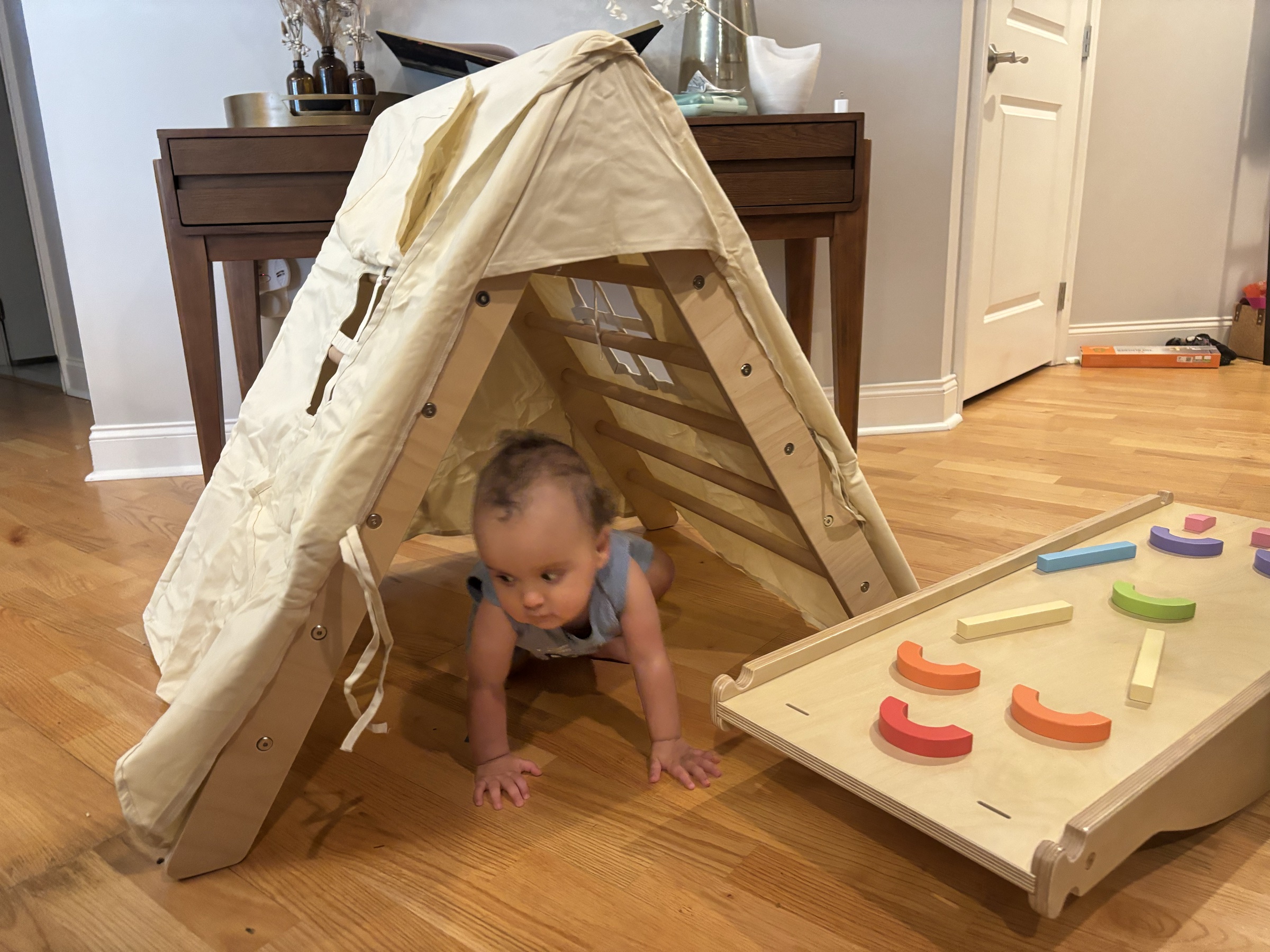 Pikler triangle with the tent accessory